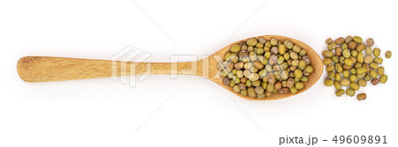 Mung beans in a wooden spoon isolated on white background. Top view 49609891