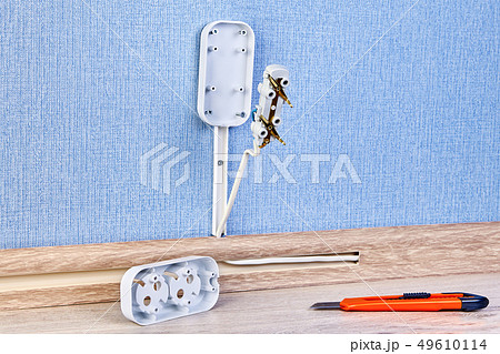 Installing electrican plug socket. Installing electrican plug socket. 49610114