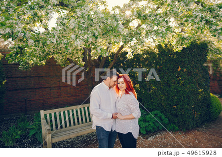 elegant family in a park elegant family in a park 49615928
