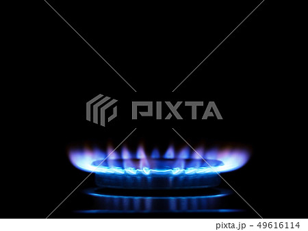 Kitchen burner flaming in the dark 49616114