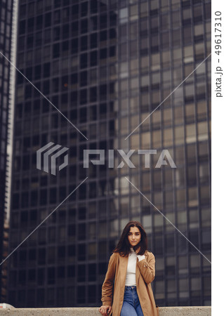 woman walks the streets of Chicago woman walks the streets of Chicago 49617310