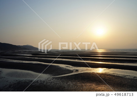 干潟が美しい午後の御輿来海岸 49618713