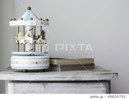 Carousel horse on vintage cabinet 49620791