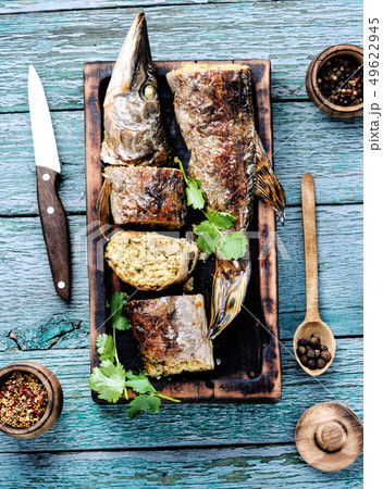 Pike stuffed with vegetables Pike stuffed with vegetables 49622945