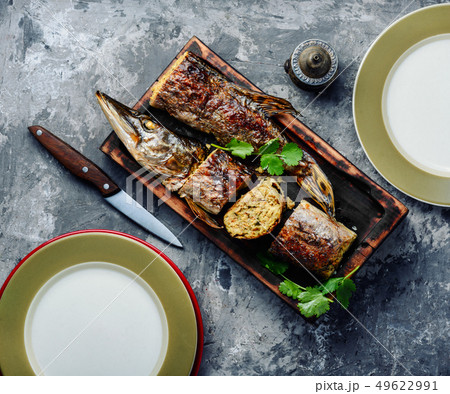 Pike stuffed with vegetables 49622991