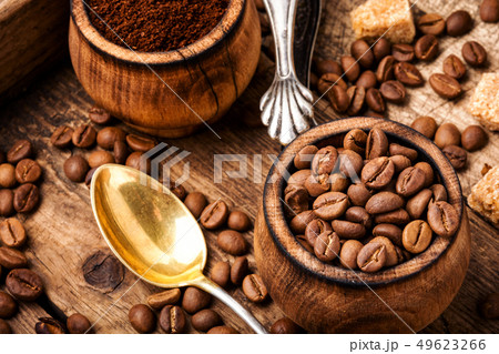 Coffee beans and grounds Coffee beans and grounds 49623266
