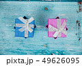 Gift Boxes on Blue Background 49626095