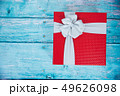 Gift Box on Blue Background 49626098
