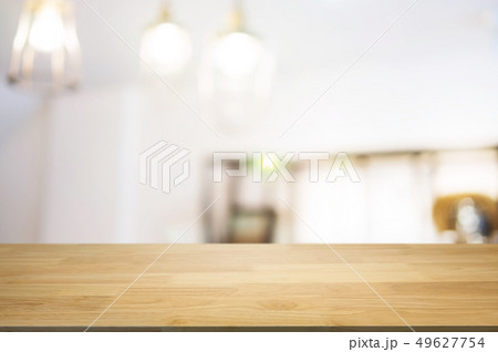 blank wooden table with blurred montage coffee shop cafe backgro 49627754