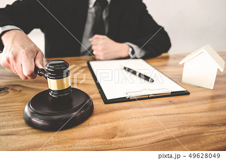 Real Estate concept, judge gavel / lawyer in auction with house 49628049