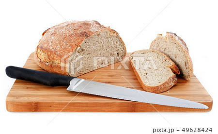 loaf of bread and knife 49628424