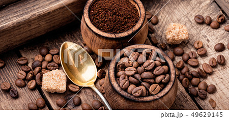 Coffee beans and grounds Coffee beans and grounds 49629145