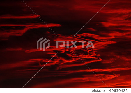 Dramatic fiery black and red storm sky 49630425
