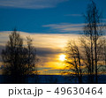 Cold winter sunset in the North with clouds 49630464
