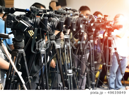 Video camera tape recording TV and journalist 49639849