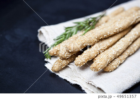 Italian grissini or salted bread sticks with 49651357
