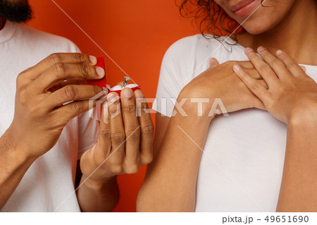 African american man making proposal with beautiful ring African american man making proposal with beautiful ring 49651690