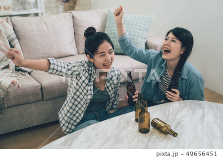 写真素材: friends watching soccer on tv celebra