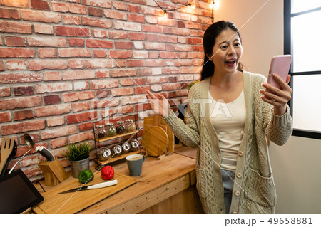 positive friendly girl having video phone call 49658881