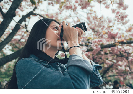 girl shooting cherry blossom in Osaka Mint Bureau girl shooting cherry blossom in Osaka Mint Bureau 49659001