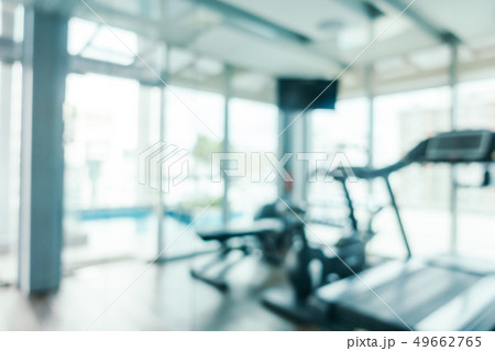 Abstract blur and defocused fitness sport equipment in gym room interior Abstract blur and defocused fitness sport equipment in gym room interior 49662765