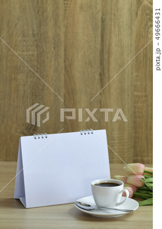 Holiday concept coffee and empty calendar 49666431