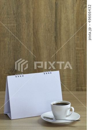 Holiday concept coffee and empty calendar 49666432