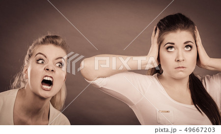 Two women having argue 49667203