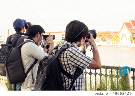 Group of men are standing photograph on the 49668429