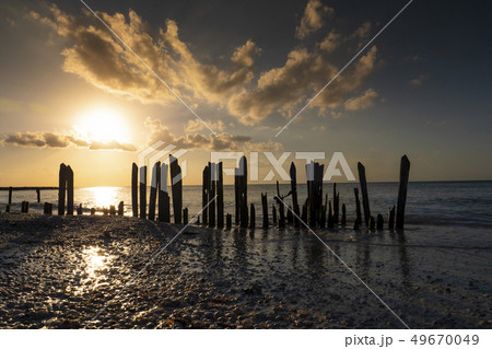 Holbox Island pier palapa sunset beach in Mexico Quintana roo Holbox Island pier palapa sunset beach in Mexico Quintana roo 49670049