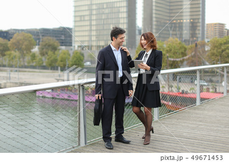 Married business couple make purchases by credit card. 49671453