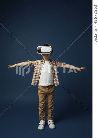 Child with virtual reality headset 49672563