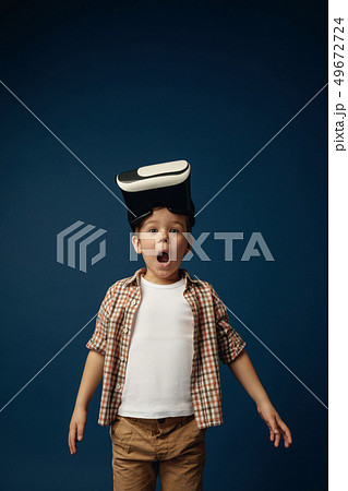 Child with virtual reality headset Child with virtual reality headset 49672724