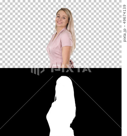 Pretty woman showing her dress to the camera, Alpha Channel 49674139