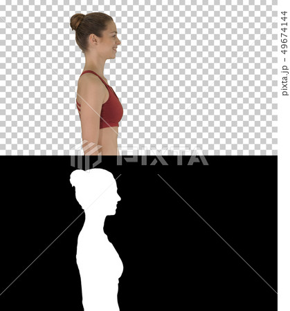 Attractive woman in sport ware walking smiling, Alpha Channel Attractive woman in sport ware walking smiling, Alpha Channel 49674144