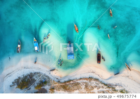 Aerial view of the fishing boats in azure sea Aerial view of the fishing boats in azure sea 49675774