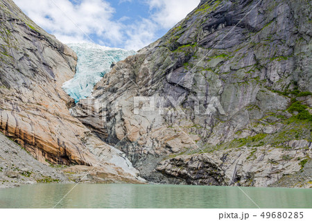 Melting Briksdal glacier in Norway, close up 49680285