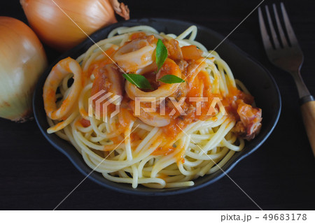 Spaghetti pasta with tomato sauce and basil on 49683178