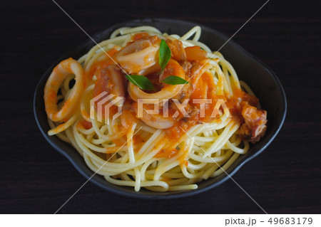 Spaghetti pasta with tomato sauce and basil on 49683179