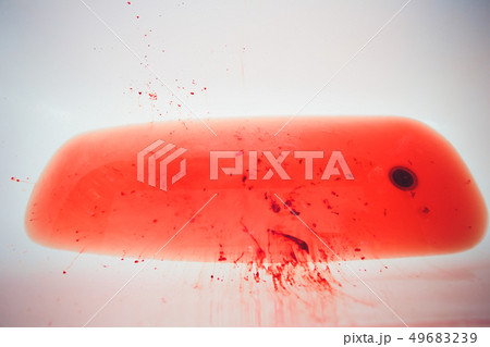 Splashes of blood dripping into the sink in the bathroom. 49683239