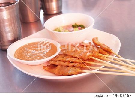 Grilled Pork Satay with Cucumber Salad Grilled Pork Satay with Cucumber Salad 49683467