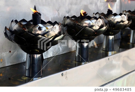 Row of Gasoline Lamp or Oil Lamp in Lotus Shape Row of Gasoline Lamp or Oil Lamp in Lotus Shape 49683485