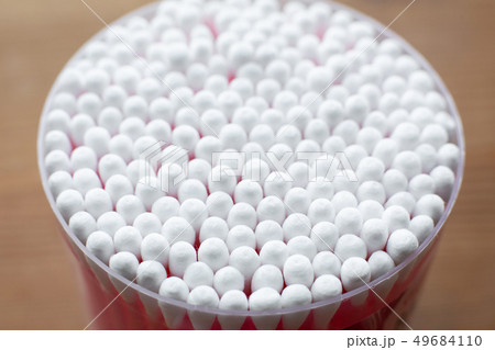 Closeup view from above on round pack of cotton Closeup view from above on round pack of cotton 49684110
