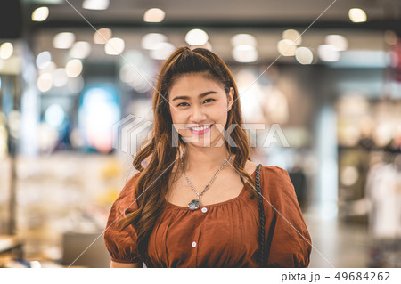 woman working with computer laptop and thinking to 49684262