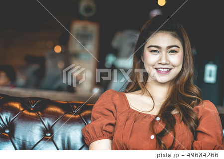 woman working with computer laptop and thinking to 49684266