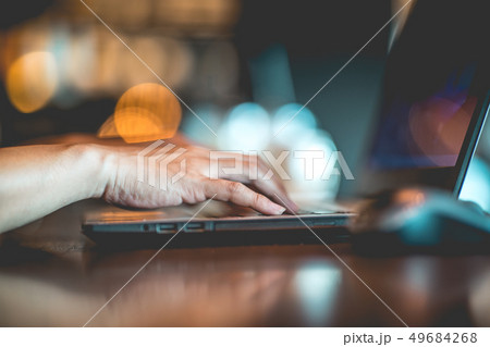 woman working with computer laptop and thinking to 49684268