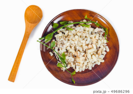 Fresh Red ant eggs are larvae of ants in wood dish Fresh Red ant eggs are larvae of ants in wood dish 49686296