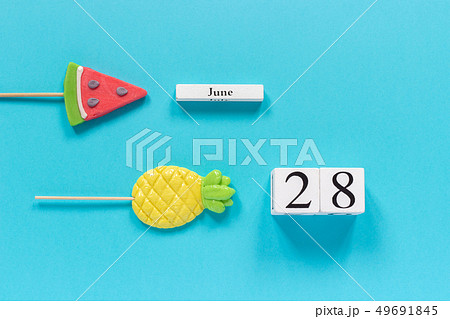 Wooden cubes calendar date June 28th and summer Wooden cubes calendar date June 28th and summer 49691845
