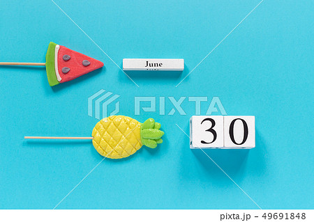 Wooden cubes calendar date June 30th and summer Wooden cubes calendar date June 30th and summer 49691848