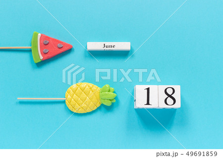Wooden cubes calendar date June 18th and summer 49691859